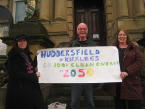 Huddersfield FoE supporters on the steps of Huddersfield Town Hall