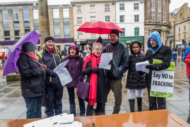 Anti-fracking choir outside Barclays Huddersfield